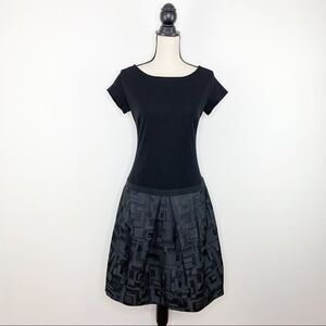 Lida Baday Black Short Sleeved Cocktail Dress w/Full Skirt and Grosgrain Trim 8‎